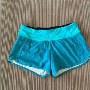 Lululemon teal shorts size 8